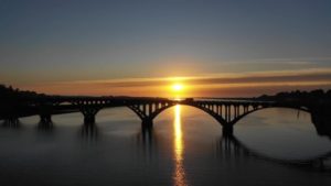 Sunset behind bridge